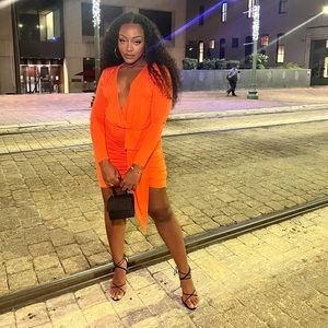 Orange low cut knit dress